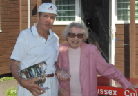 August Tournament: Dick Knapp, Abbey Challenge Cup winner, with Hyacinth Coombs